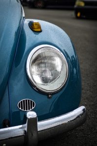Close-up of a blue vw beetle's light